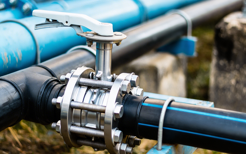 OTOM Services lugged-type butterfly valve for industrial piping systems.