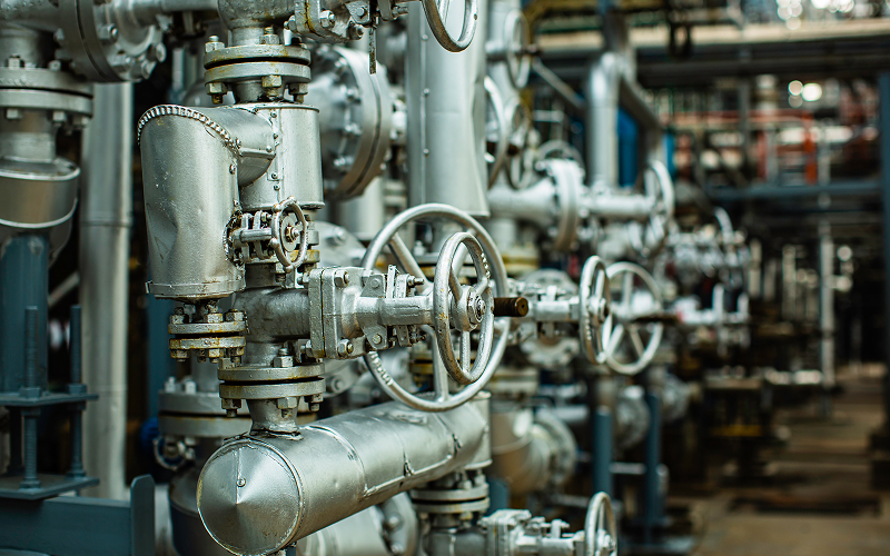 Multiple industrial handwheel valves in a water treatment facility.