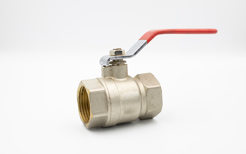 Threaded silver ball valve with red manual lever handle.